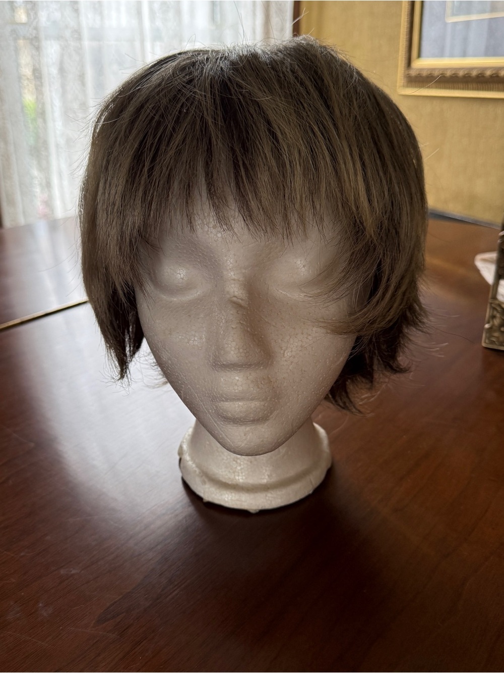 Rene of Paris Short Layered Women’s Wig in Ash Light Brown